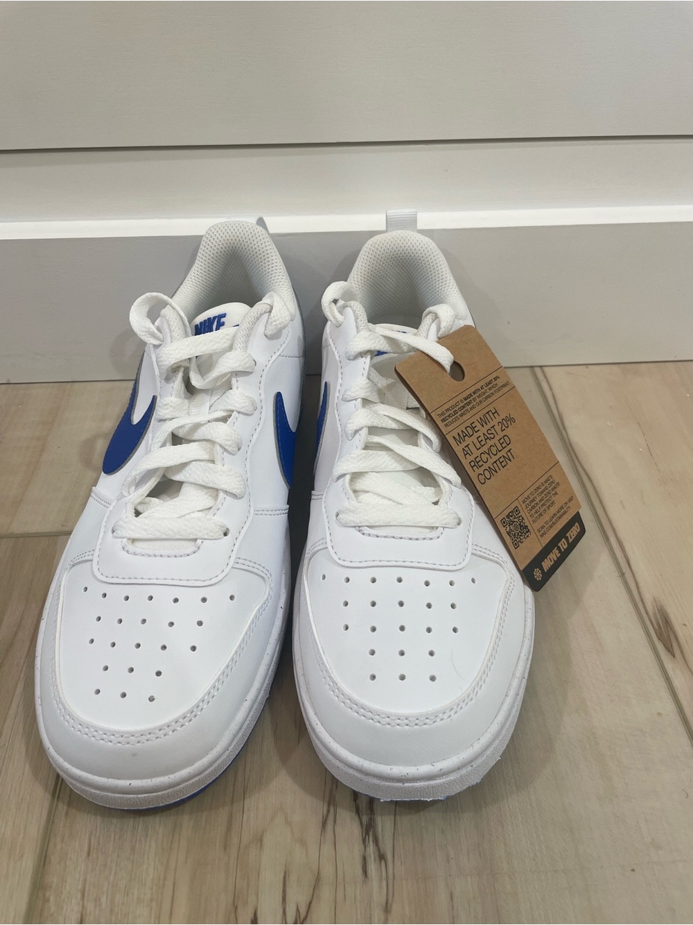 Nike Kids White Sneakers with Blue Swoosh